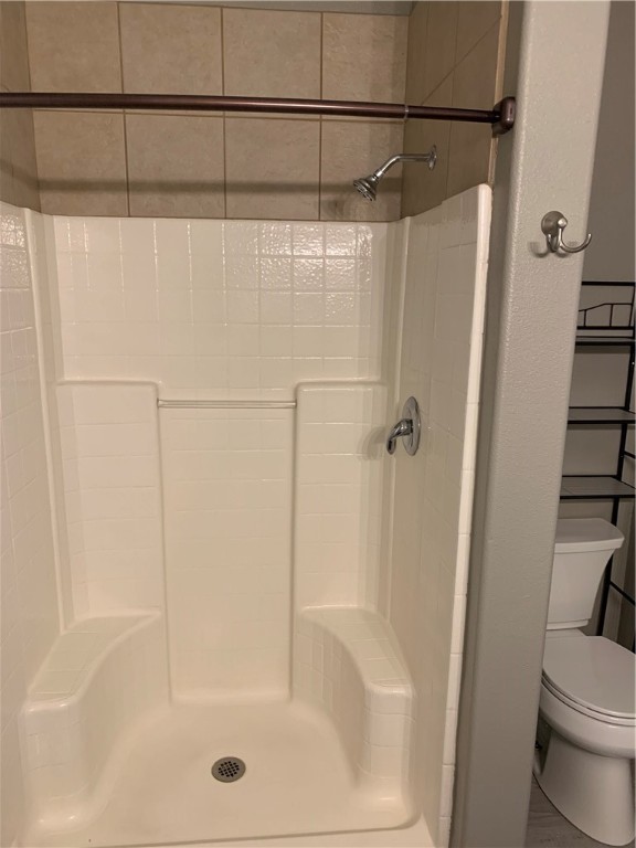 929 Moore Avenue Portland, TX 78374 - Photo 15 of 18 a bathroom with a shower and toilet