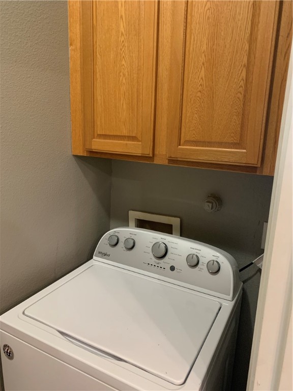 929 Moore Avenue Portland, TX 78374 - Photo 8 of 18 a close up view of washer and dryer