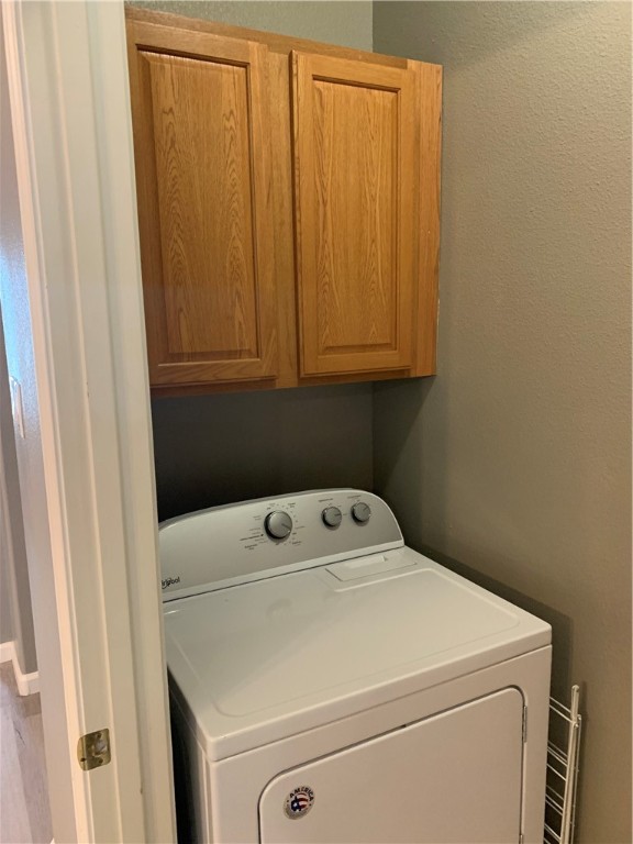 929 Moore Avenue Portland, TX 78374 - Photo 9 of 18 a utility room with dryer and washer