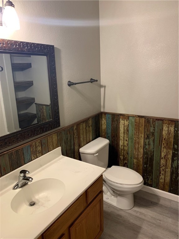 929 Moore Avenue Portland, TX 78374 - Photo 10 of 18 a bathroom with a sink a toilet and mirror