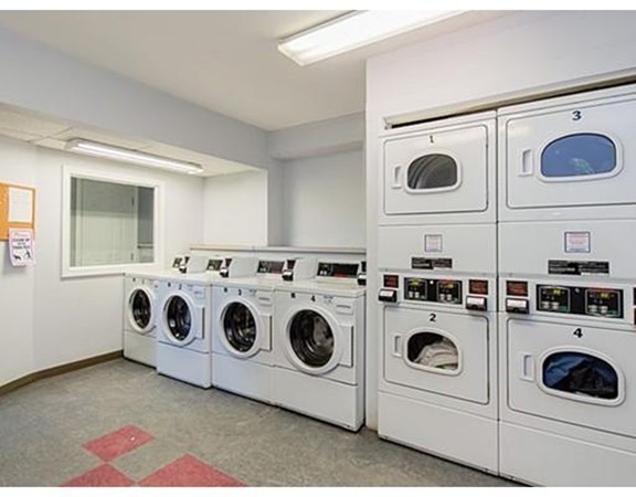 1450 Beacon Street, Unit 504 Brookline, MA 02446 - Photo 11 of 21 a utility room with dryer and washer