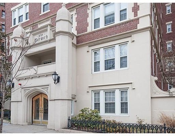 1450 Beacon Street, Unit 504 Brookline, MA 02446 - Photo 13 of 21 a view of a building with a lot of windows
