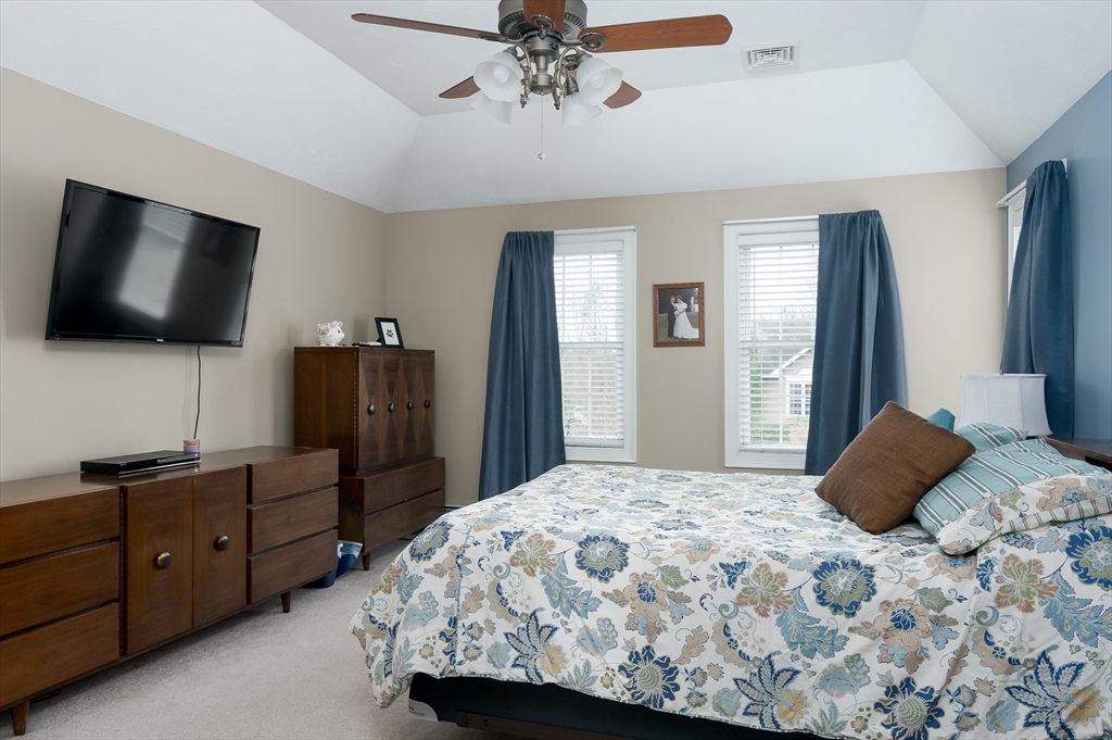 34 Marjorie Lane Rutland, MA 01543 - Photo 14 of 33 a bedroom with a bed and a flat screen tv
