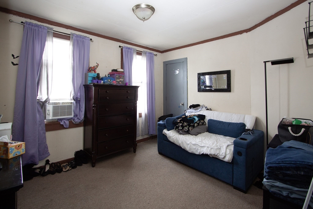 66 Cutler Street Worcester, MA 01604 - Photo 20 of 27 a living room with furniture and a flat screen tv