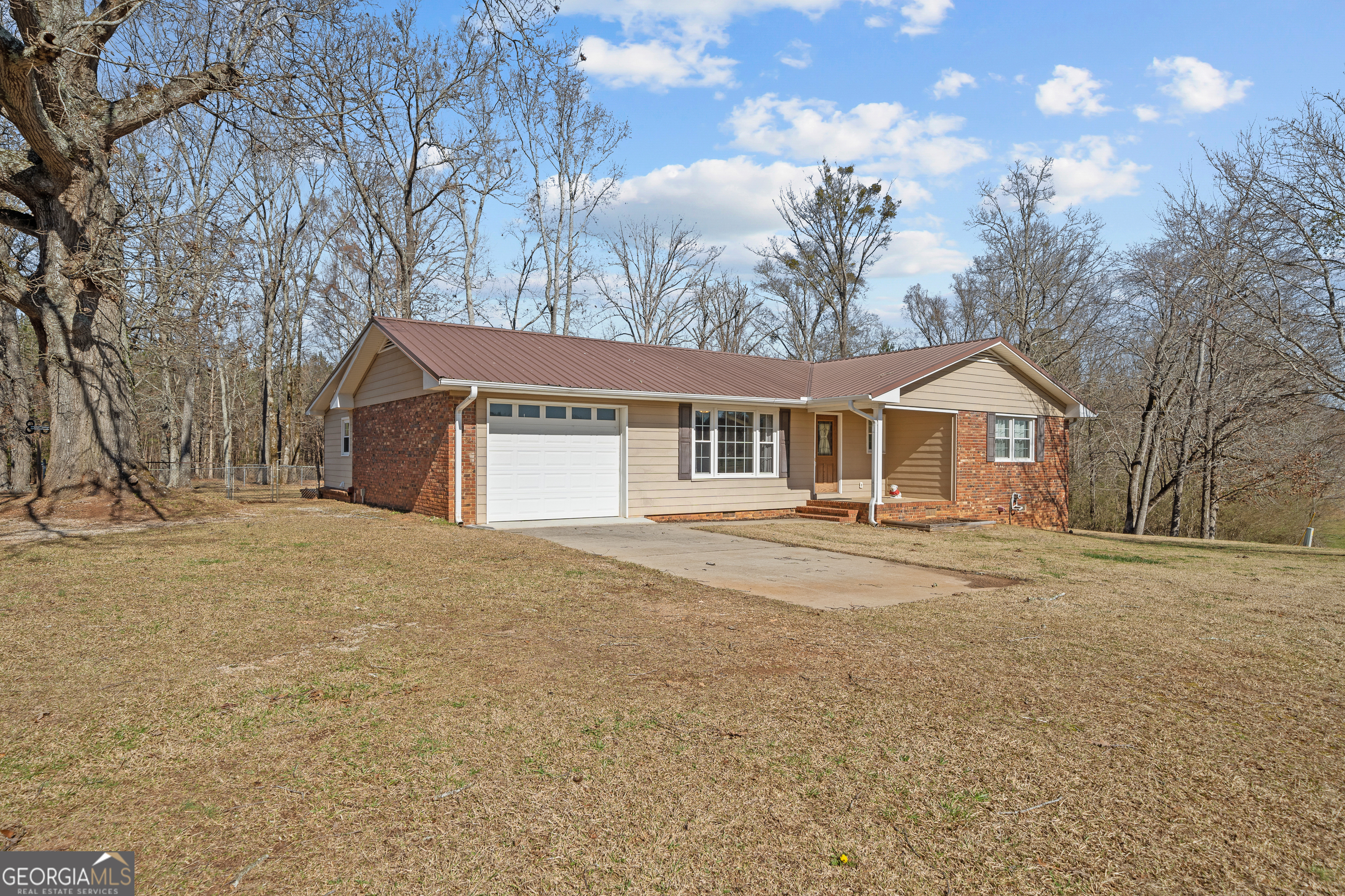 a house with trees in front of it