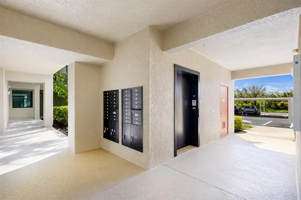 a view of a swimming pool and trees in the background