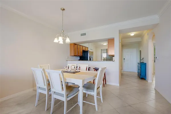 a kitchen with granite countertop stainless steel appliances a sink and cabinets