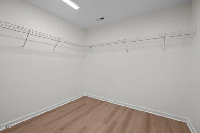 a bathroom with a sink and vanity