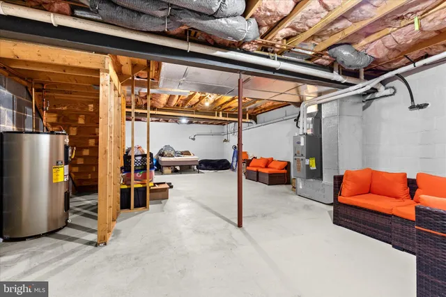 a street sign on a wall next to a building