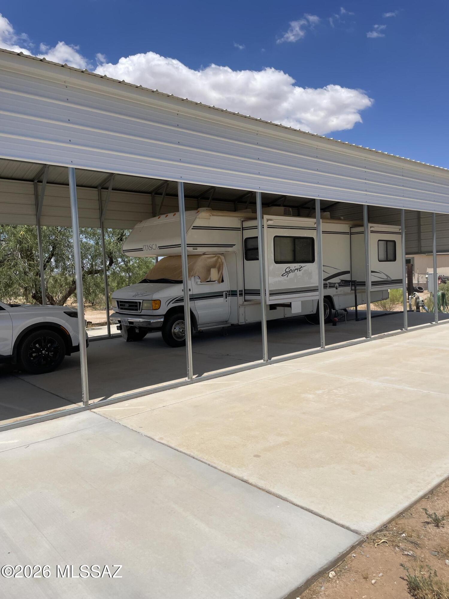 8535 South Marstellar Road Tucson, AZ 85736 - Photo 6 of 30 RV port with Lg slabs of concrete