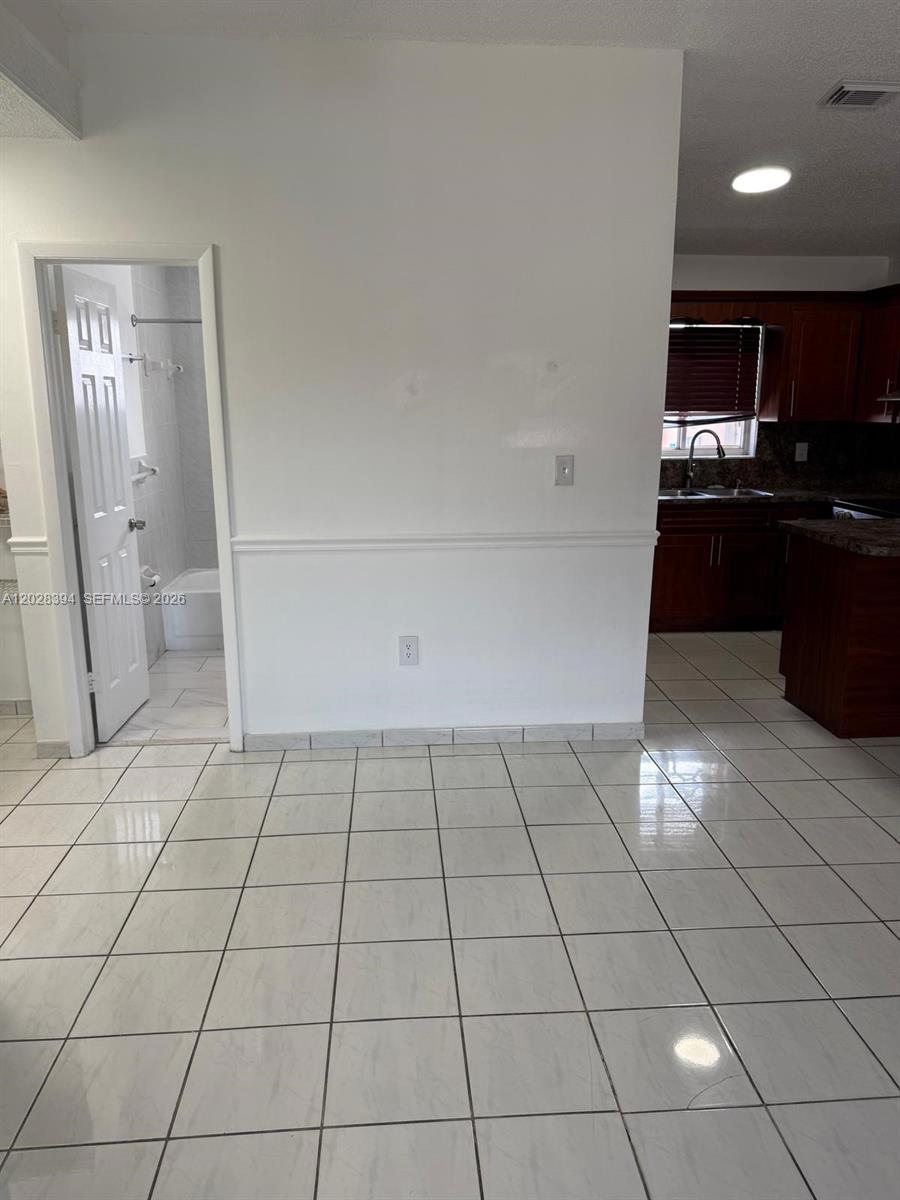 2212 West 74th Street, Unit 20128 Hialeah, FL 33016 - Photo 4 of 11 a view of a kitchen with a sink