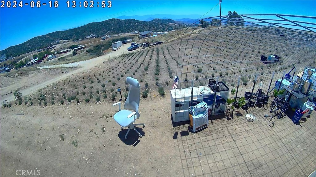 a view of roof with sitting area