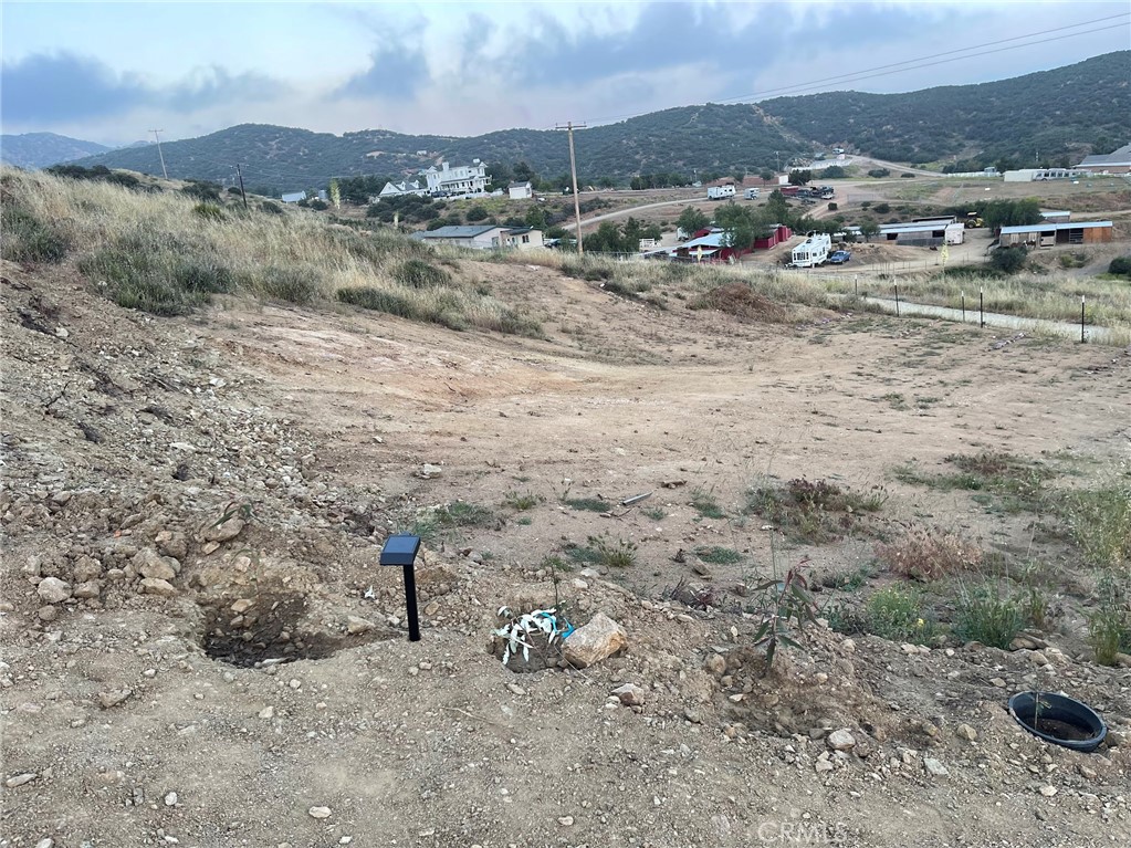 0 Shannon Valley Road Acton, CA 93510 - Photo 13 of 14 a view of a dry field with mountains in the background