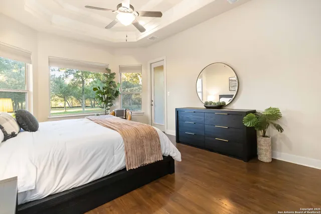 a bath tub sitting in a bathroom next to a window