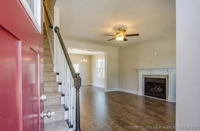 a view of an entryway with a chandelier