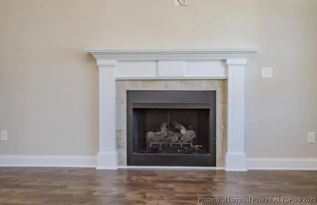 a view of a livingroom with a fireplace