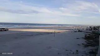 3727 South Atlantic Avenue, Unit 3150 Daytona Beach, FL 32118 - Photo 38 of 39 a view of an empty room with kitchen