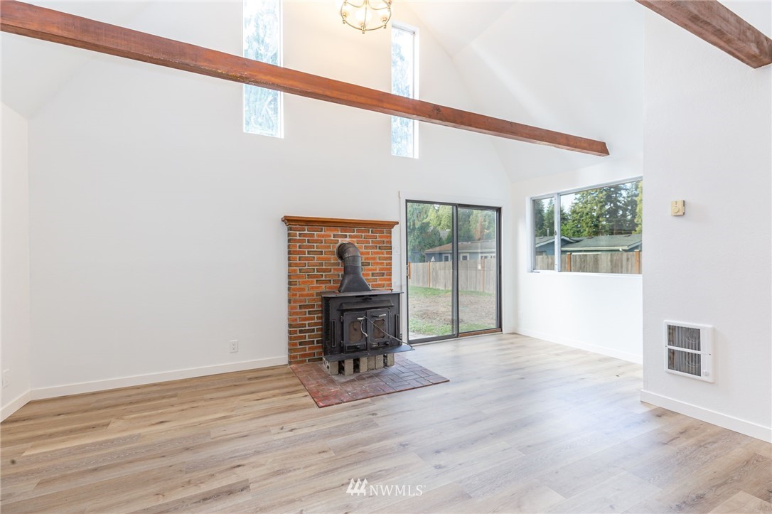 17306 North Road Bothell, WA 98012 - Photo 22 of 36 a view of livingroom with furniture and staircase