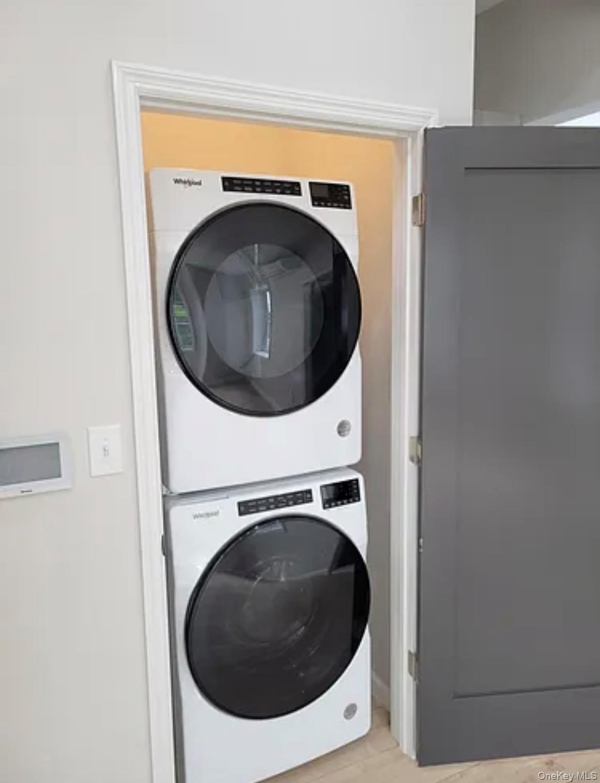 58 Smith Street, Unit 3A Poughkeepsie, NY 12601 - Photo 9 of 16 a utility room with dryer and washer