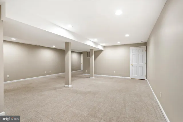 a backyard of a house with barbeque oven