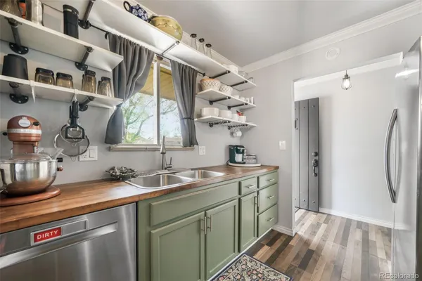 a bedroom with a bed and a desk