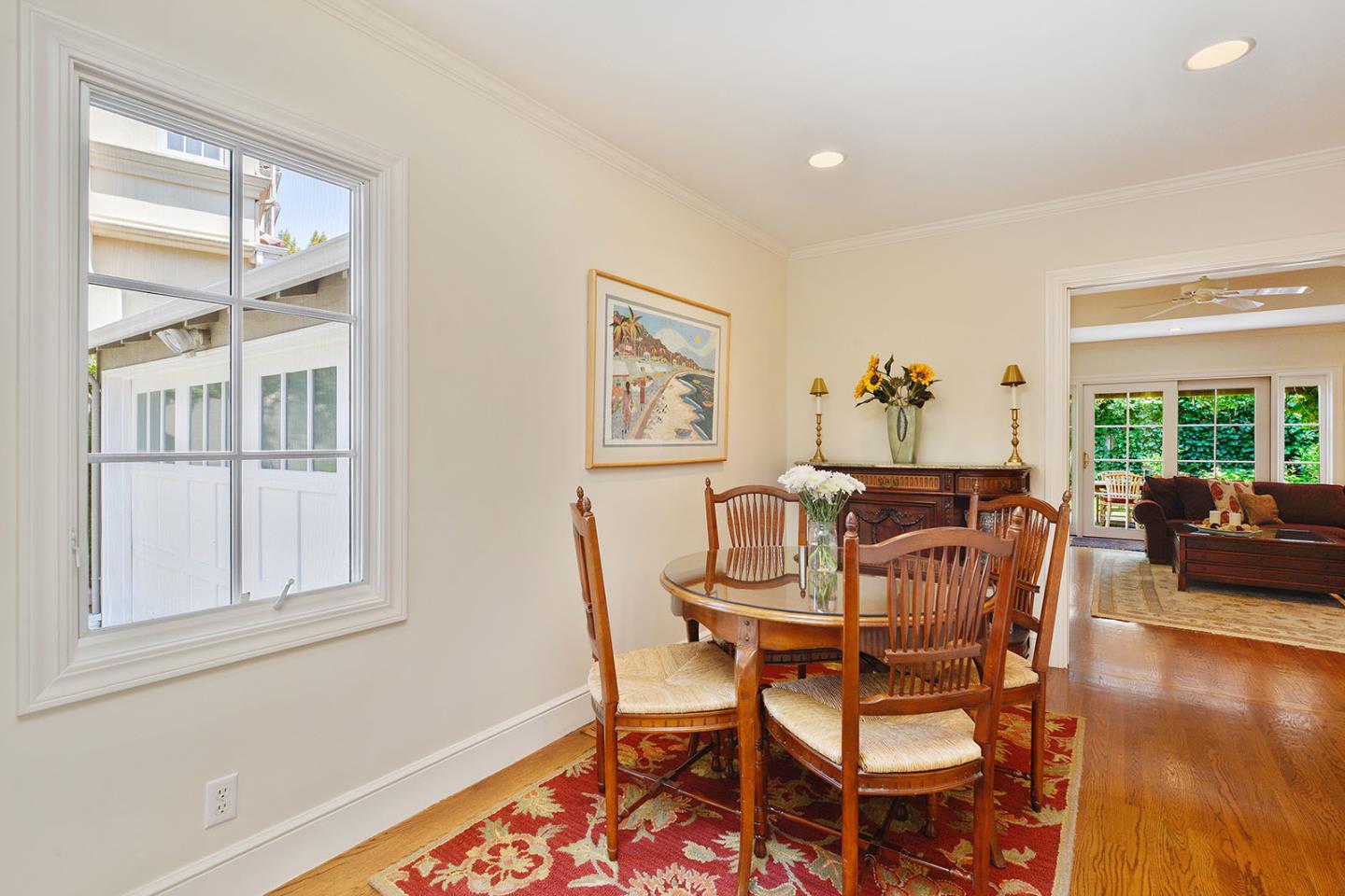 181 Warren Road San Mateo, CA 94401 - Photo 24 of 49 a dining room with furniture and wooden floor