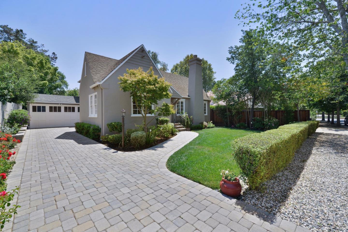 181 Warren Road San Mateo, CA 94401 - Photo 3 of 49 a view of a house with backyard and a garden