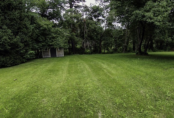 16 Radcliffe Road, Unit LEFT Billerica, MA 01821 - Photo 12 of 12 a view of a green yard