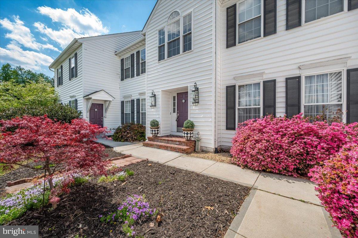 1280 St Michaels Road Mount Airy, MD 21771 - Photo 5 of 43 a front view of a house with a yard and outdoor seating