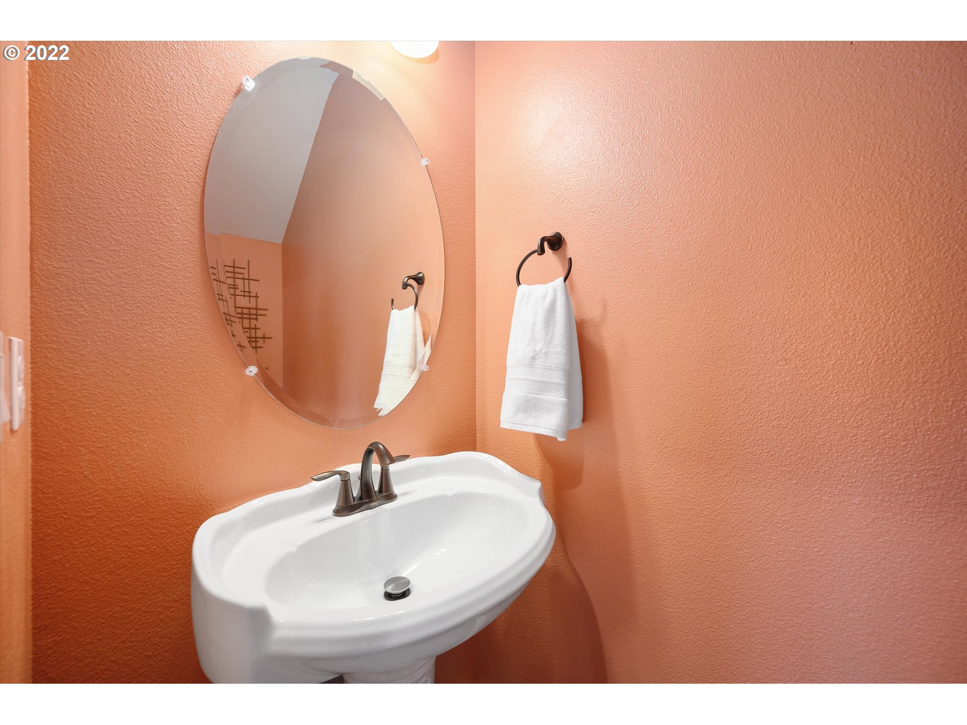 4288 Southwest Redfern Avenue Gresham, OR 97080 - Photo 17 of 32 a bathroom with a sink and mirror