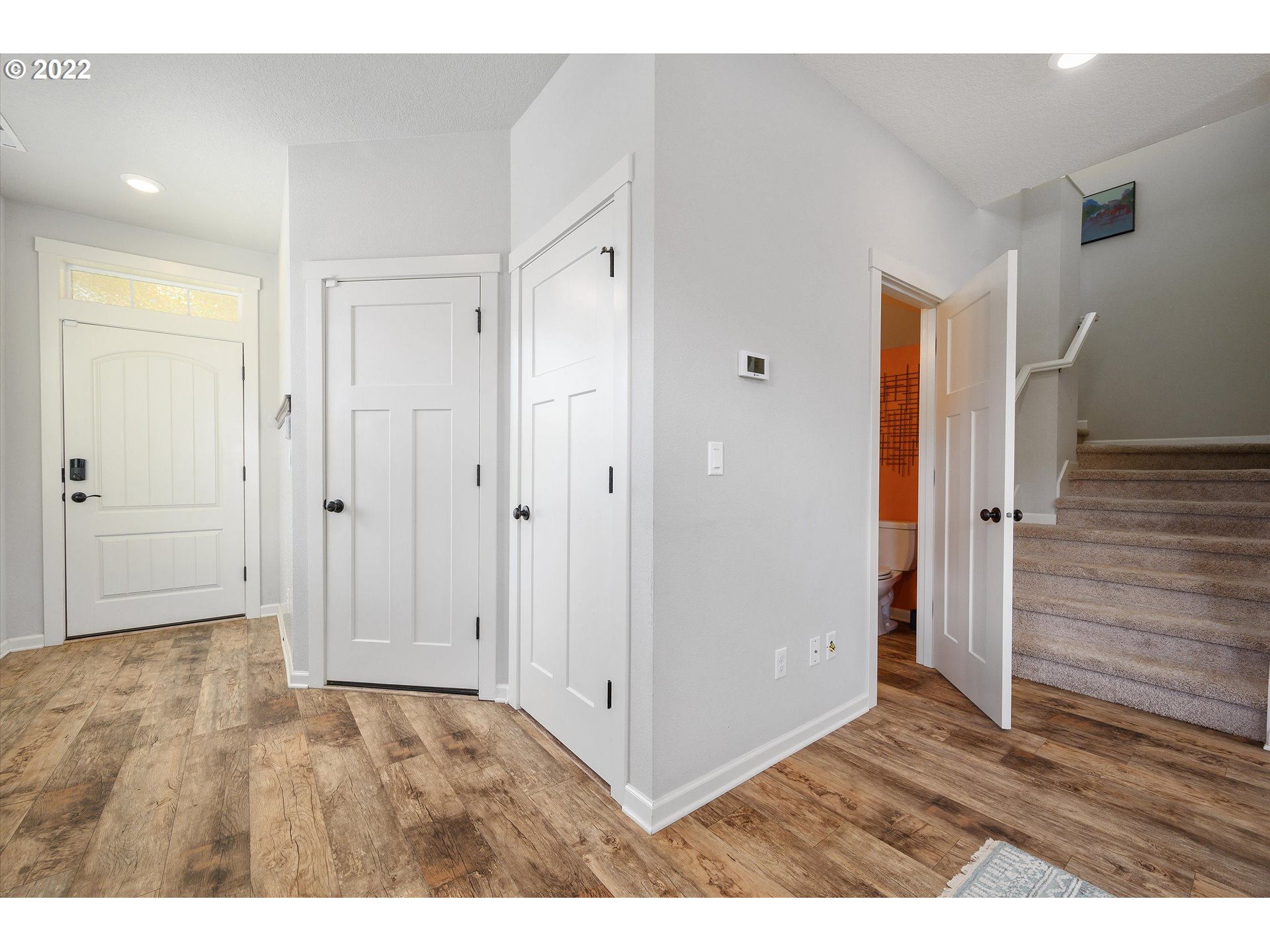 4288 Southwest Redfern Avenue Gresham, OR 97080 - Photo 2 of 32 a view of an empty room with wooden floor