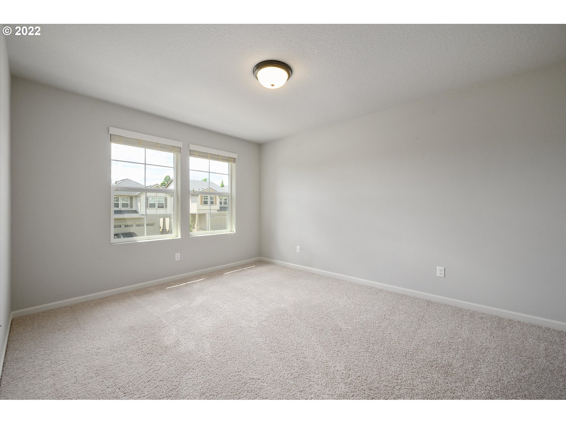 4288 Southwest Redfern Avenue Gresham, OR 97080 - Photo 23 of 32 a view of an empty room with a window