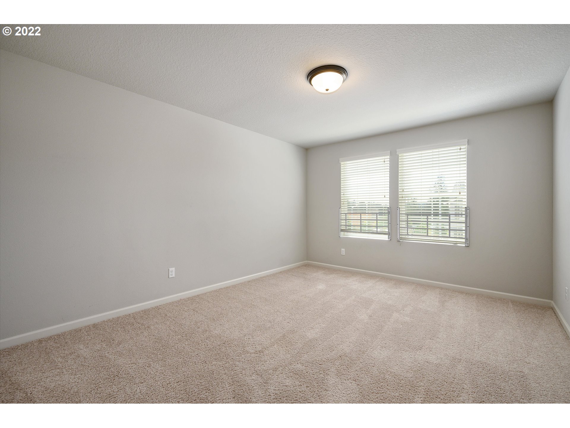 4288 Southwest Redfern Avenue Gresham, OR 97080 - Photo 24 of 32 a view of an empty room with a window