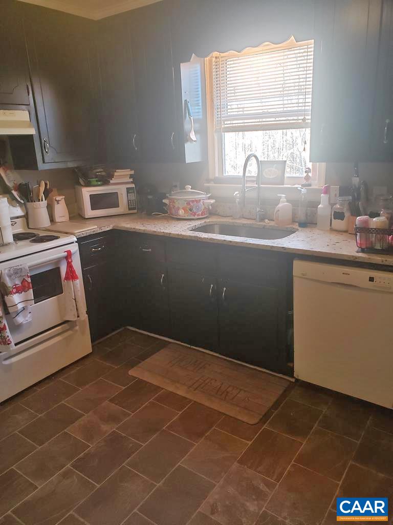 2965 Redd Shop Road Farmville, VA 23901 - Photo 5 of 16 a room with a sink cabinets and window