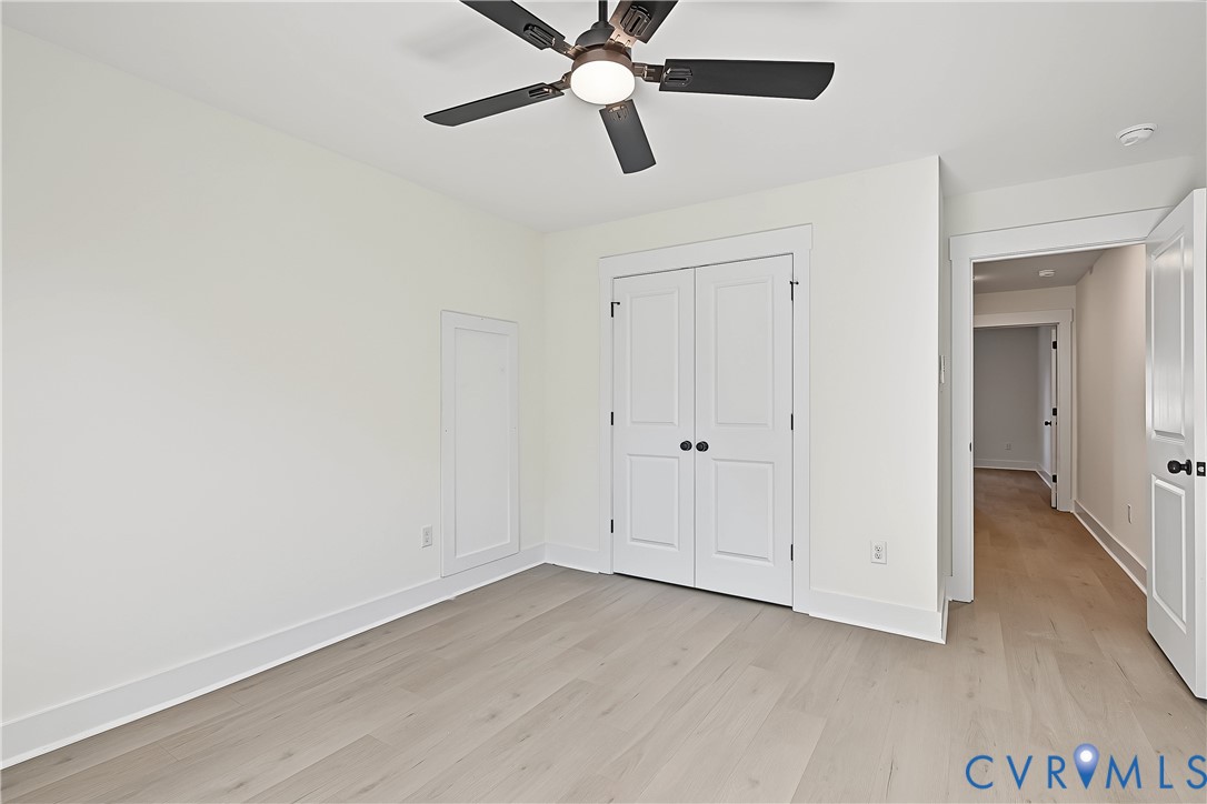 3601.5 Decatur Street Richmond, VA 23224 - Photo 29 of 32 Wood-finish flooring, white paneled doors, ceiling