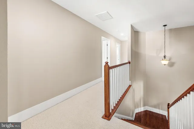 a view of a garden from a balcony