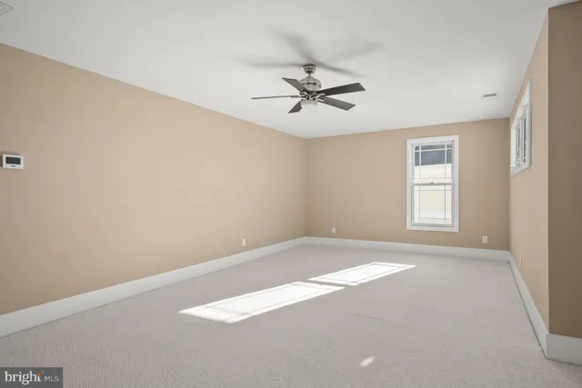 a front view of a house with swimming pool