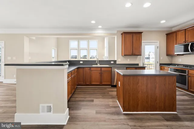 a living room with furniture and a lamp