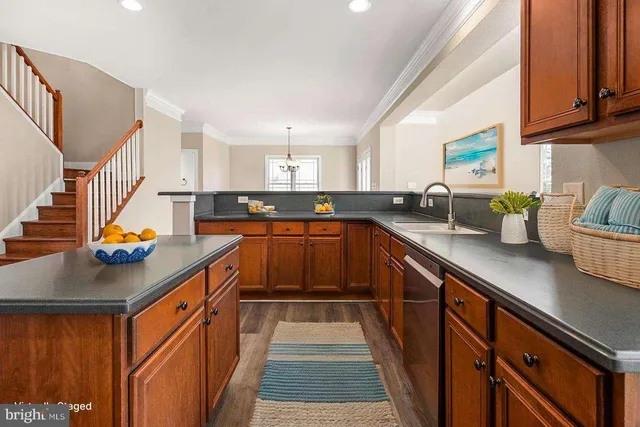 a view of a living room and floor to ceiling window or wooden floor