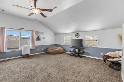 a room with a couch and a window