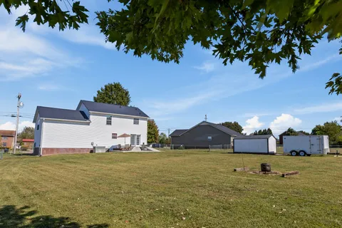 a view of a house with a big yard