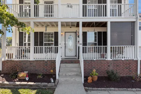 a view of a house with a porch