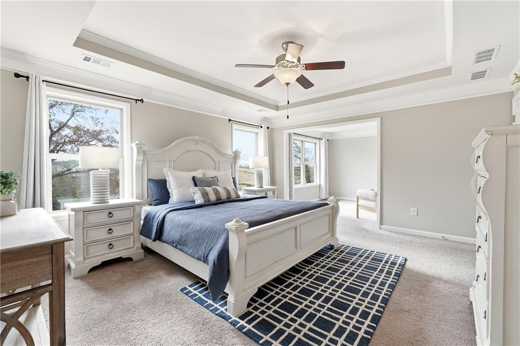 4735 Shiloh Valley Road Cumming, GA 30040 - Photo 13 of 39 a bedroom with a bed and a window
