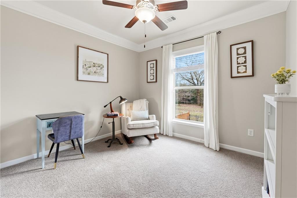 4735 Shiloh Valley Road Cumming, GA 30040 - Photo 18 of 39 a living room with furniture and a window