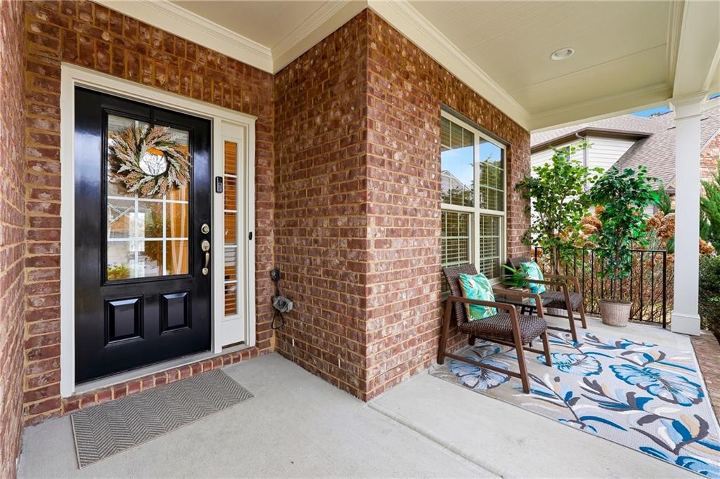 4735 Shiloh Valley Road Cumming, GA 30040 - Photo 2 of 39 a patio with table and chairs