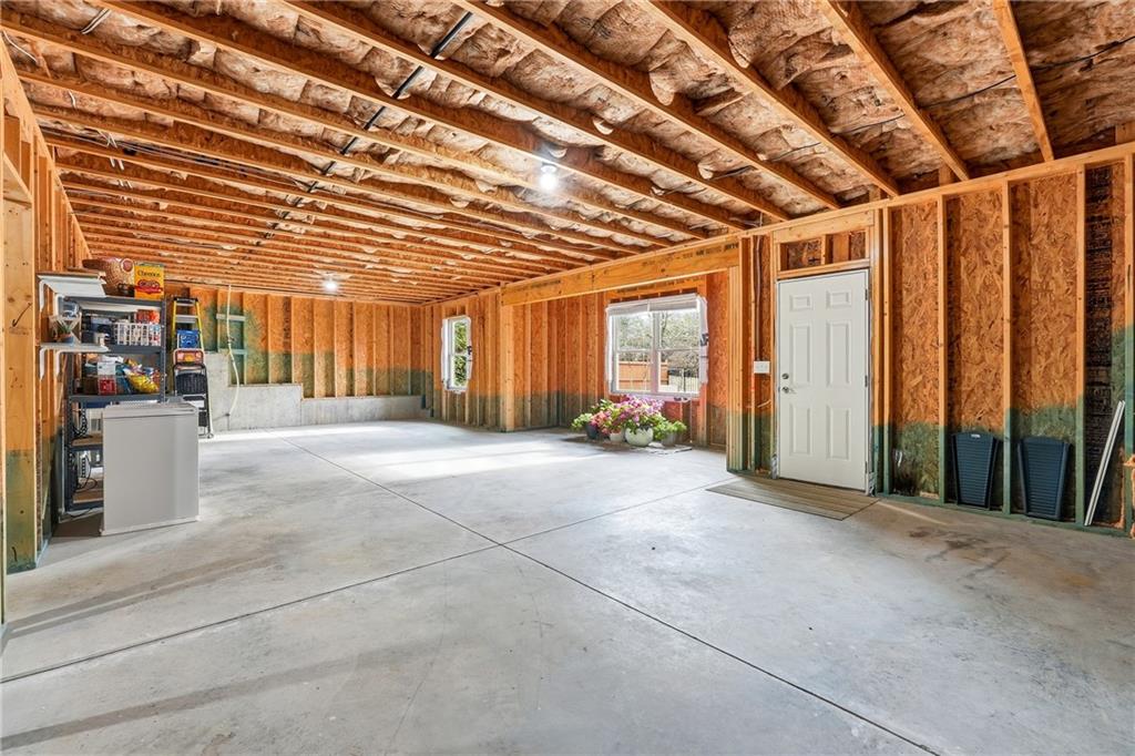 4735 Shiloh Valley Road Cumming, GA 30040 - Photo 25 of 39 a view of a room with wooden walls