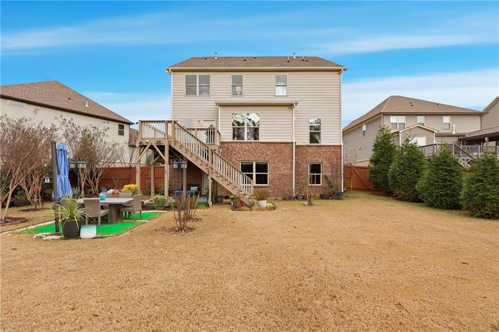 4735 Shiloh Valley Road Cumming, GA 30040 - Photo 29 of 39 a front view of a house with a yard
