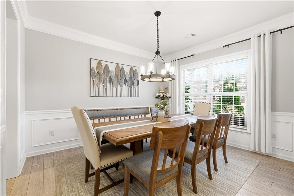 4735 Shiloh Valley Road Cumming, GA 30040 - Photo 4 of 39 a view of a dining room with furniture window and outside view
