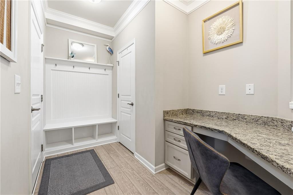 4735 Shiloh Valley Road Cumming, GA 30040 - Photo 10 of 39 a view of kitchen with furniture and wooden floor
