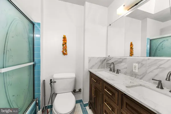a bathroom with a sink and a toilet